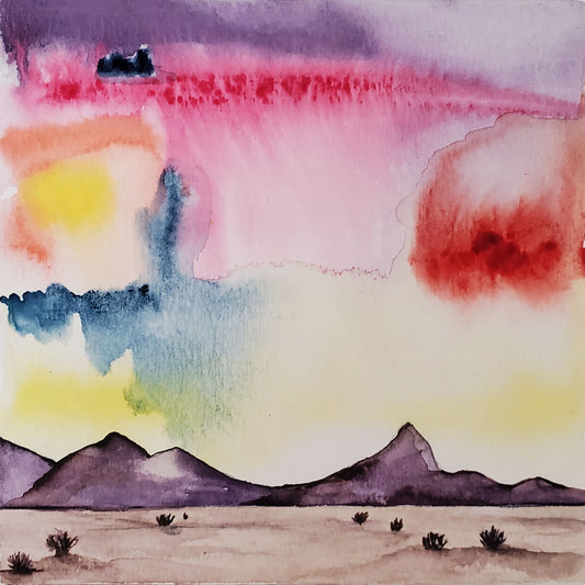 Painting the Sonoran desert with tumbleweeds and monsoon skies. Small watercolor, 5x5 inches, bright monsoon sunset sky, low mountain range and a few tumbleweeds. Ready to hang. 