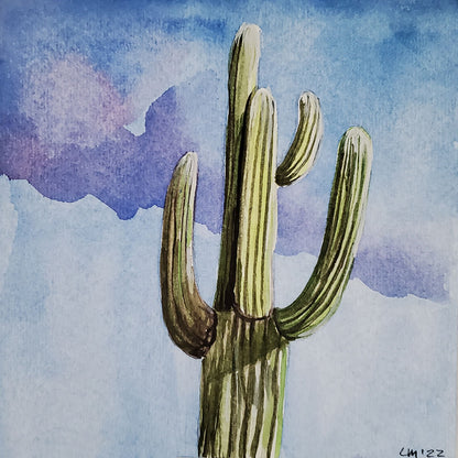 Original watercolor painting of single saguaro cactus with monsoon skies in the background Painting is mounted on wood panel with wire on the back, ready to hang 5 inches x 5 inches x 3/4 inch Signed  2022