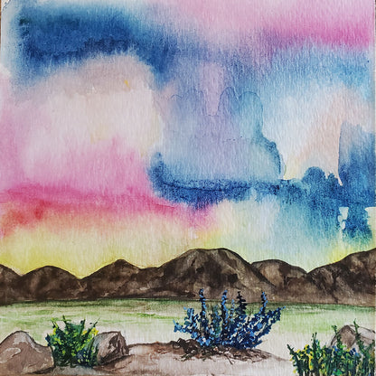 Original watercolor painting of the Sonoran desert with monsoon skies Watercolor paper is mounted on wood panel with hanging wire on back 5 inches x 5 inches x 3/4 inch Signed on back 2022